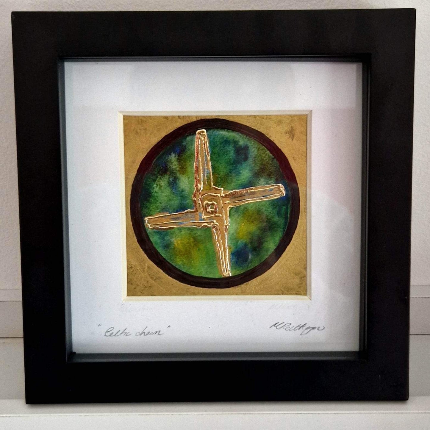 SOLD.St Bridget cross, handpainted art frame. Please enquire of you would like to request this to be made.